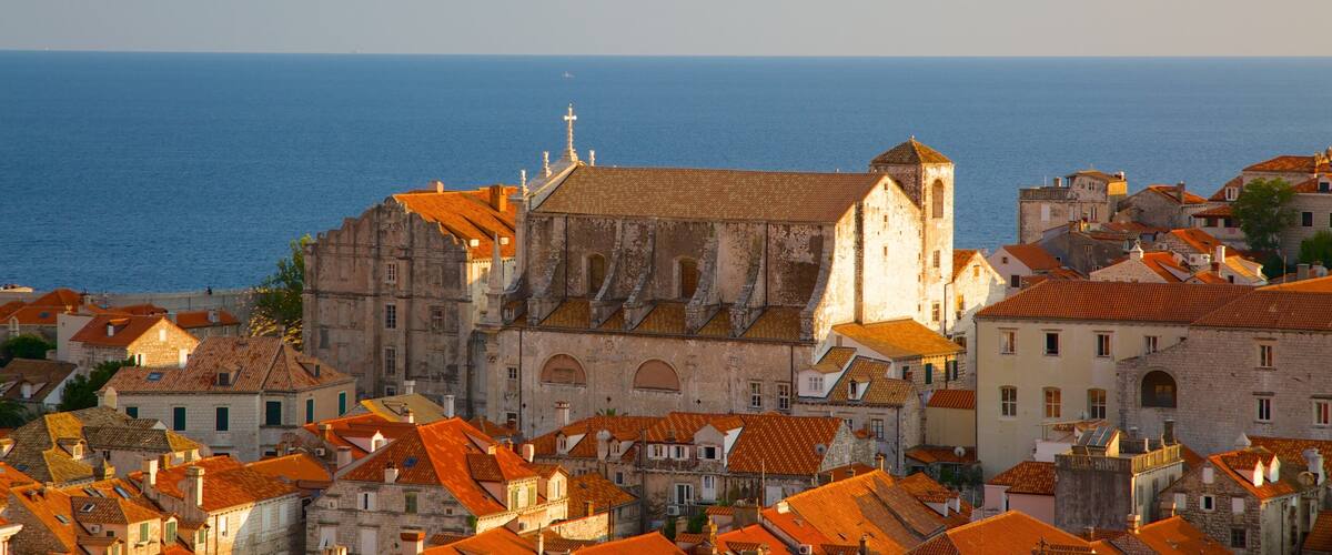 Church of St. Ignatius featuring a coastal town