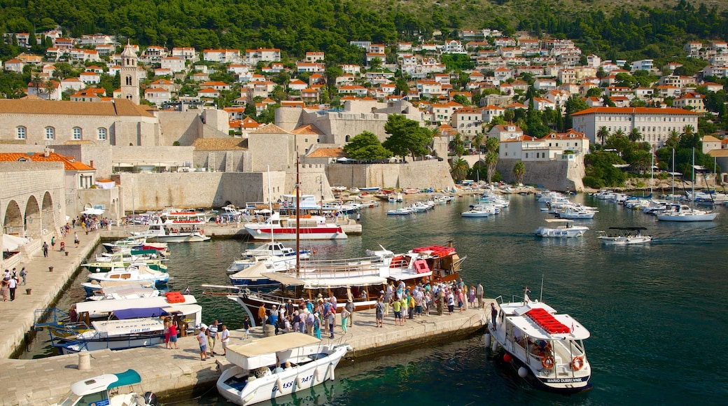 Revelin Fortress featuring a marina and a city