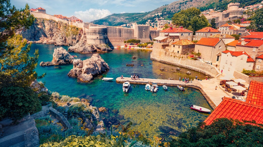 Сharm of the ancient cities of Europe. Aerial mornig view of Old Town from Fort Bokar. Picturesque summer cityscape of Dubrovnik. Sunny seascape of Adriatic sea, Croatia, Europe.