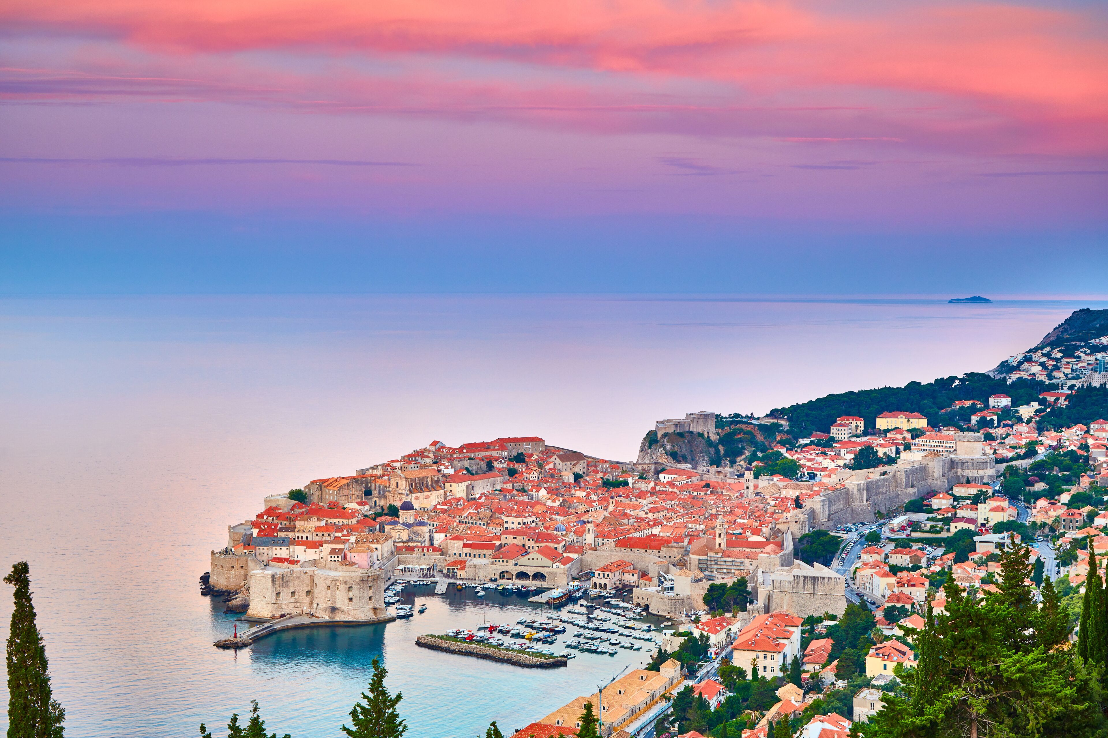 Aerial view at famous european travel destination in Croatia, Dubrovnik old town, Dalmatia, Europe. UNESCO list. Fort Bokar seen from south old walls on a sunny day in dramatic light..