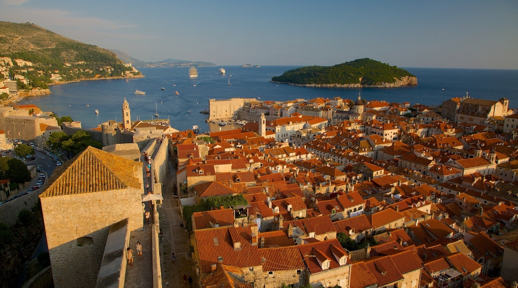 Minceta Fortress which includes general coastal views, a sunset and a coastal town