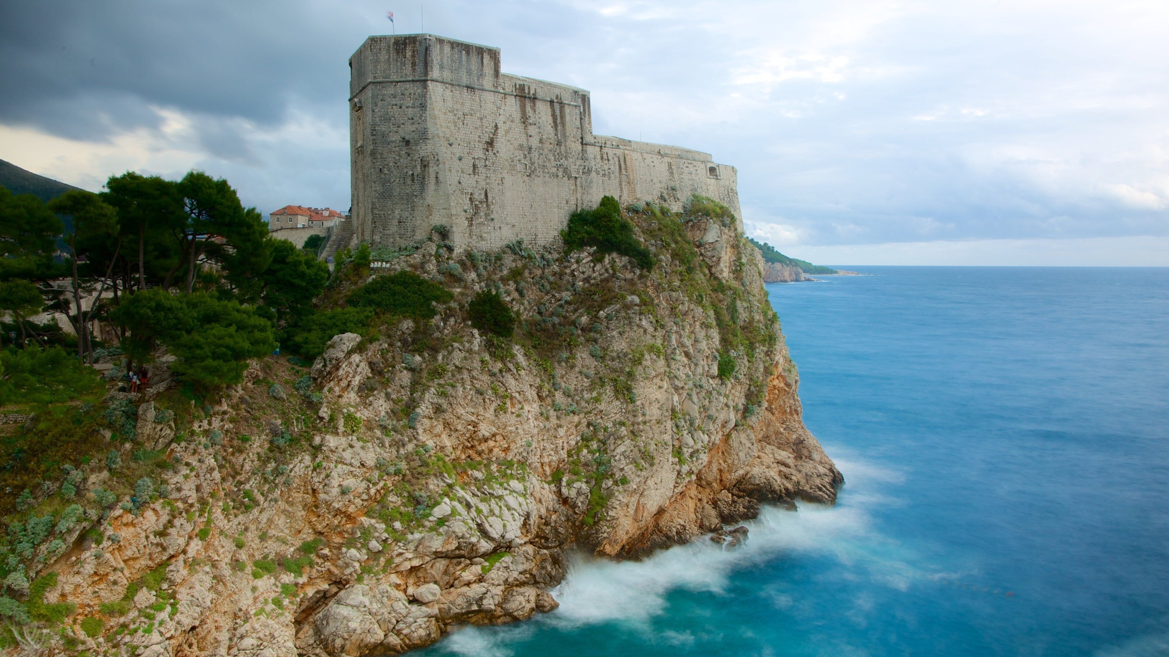 Lovrijenac Fort which includes rocky coastline and a castle
