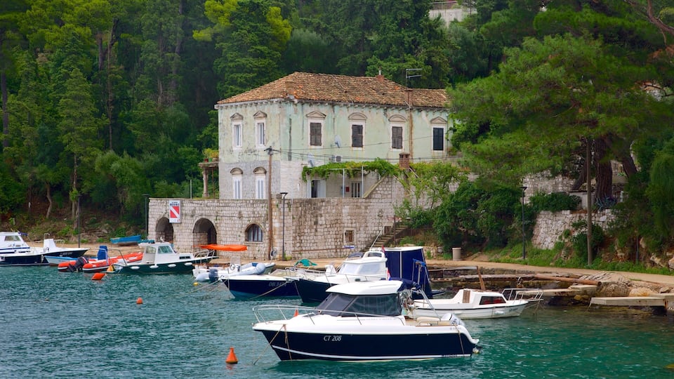 Lapad Beach which includes boating and a bay or harbor