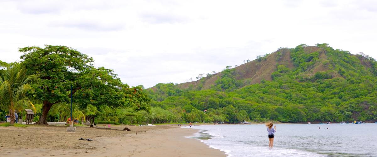 Coco Beach featuring a beach