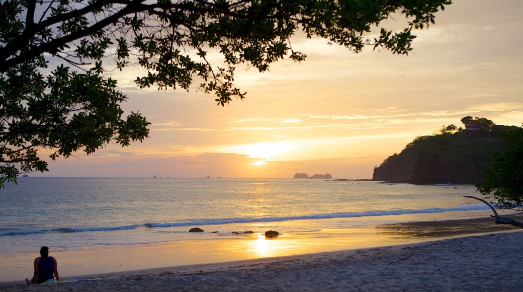 Flamingo Beach featuring a sunset and a beach