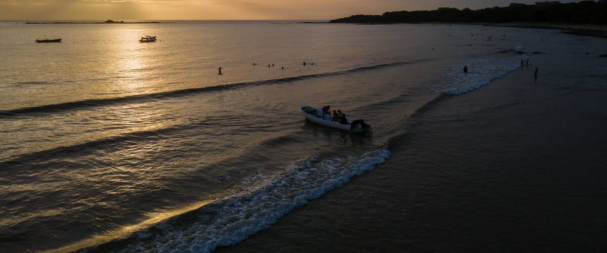 Beautiful aerial view of a sunset in the beach of Tamarindo Costa Rica in Guanacaste