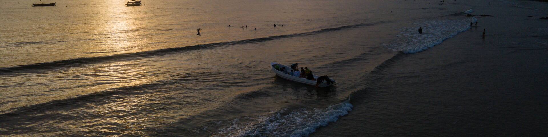 Beautiful aerial view of a sunset in the beach of Tamarindo Costa Rica in Guanacaste