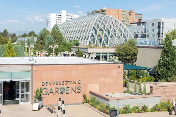 The Denver Botanic Gardens with a large glass dome structure and surrounding buildings.