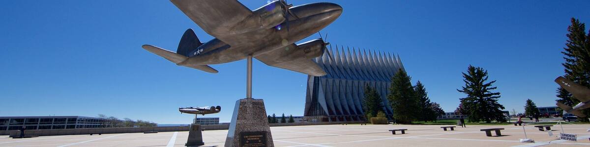 US Air Force Academy showing a memorial, military items and a square or plaza