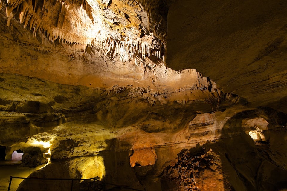 A cave with stalactites and stalagmites.