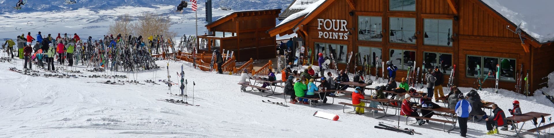 Steamboat Ski Resort featuring snow skiing and snow as well as a large group of people