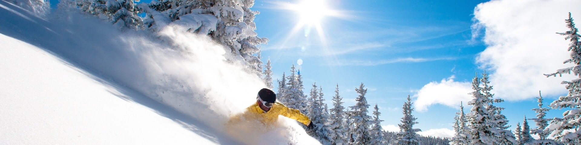 Vail Ski Resort which includes snow skiing and snow as well as an individual male