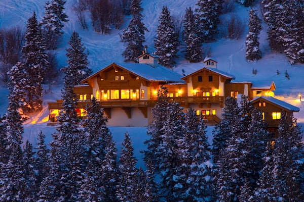 Vail Ski Resort showing a luxury hotel or resort and night scenes