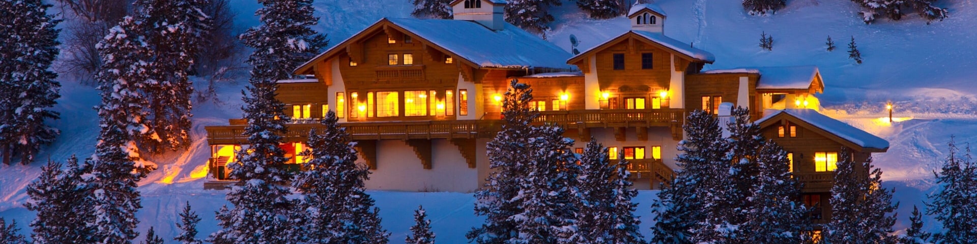 Vail Ski Resort showing a luxury hotel or resort and night scenes