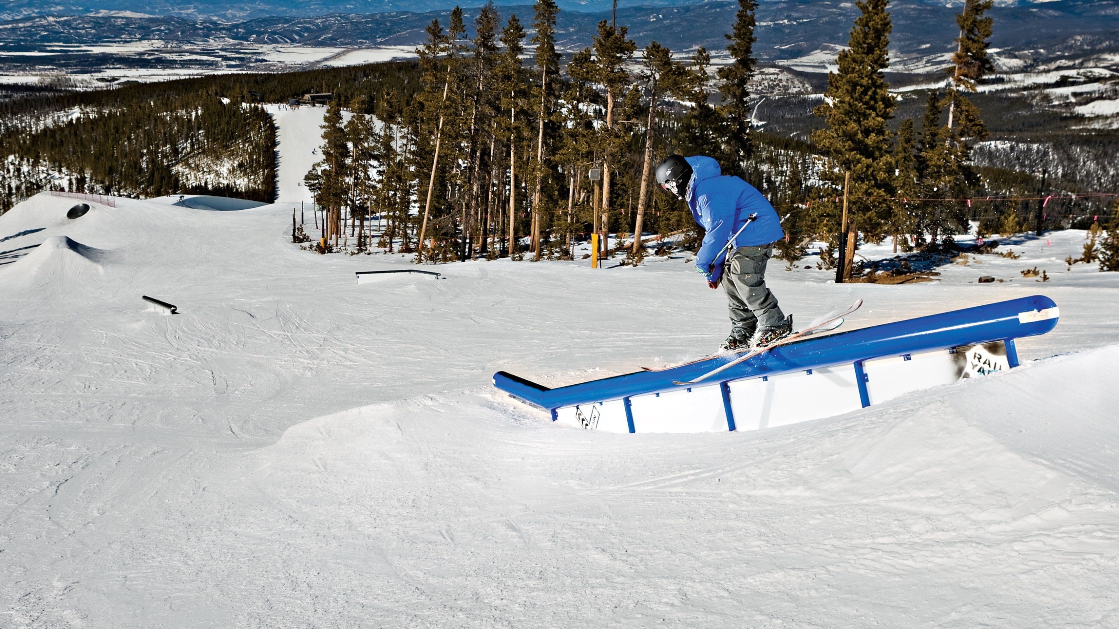 Winter Park Ski Resort featuring snow skiing and snow as well as an individual male