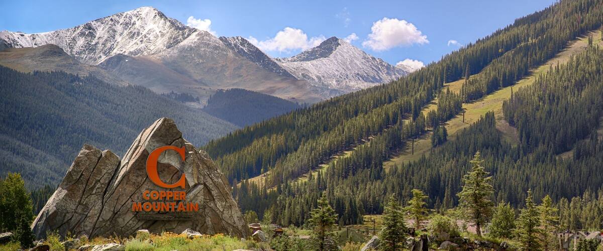 Copper Mountain Ski Resort showing forest scenes, landscape views and signage