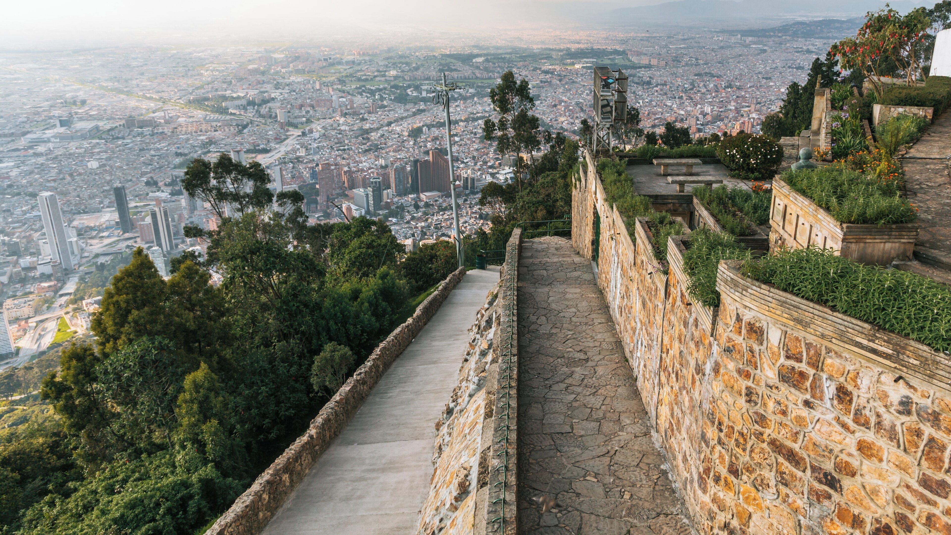 Explore Monserrate in Santa Fe, Bogotá for a breathtaking view of the city and unique natural beauty at sunset