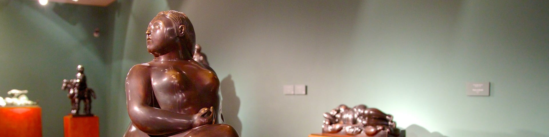 Botero Museum featuring interior views, art and a statue or sculpture