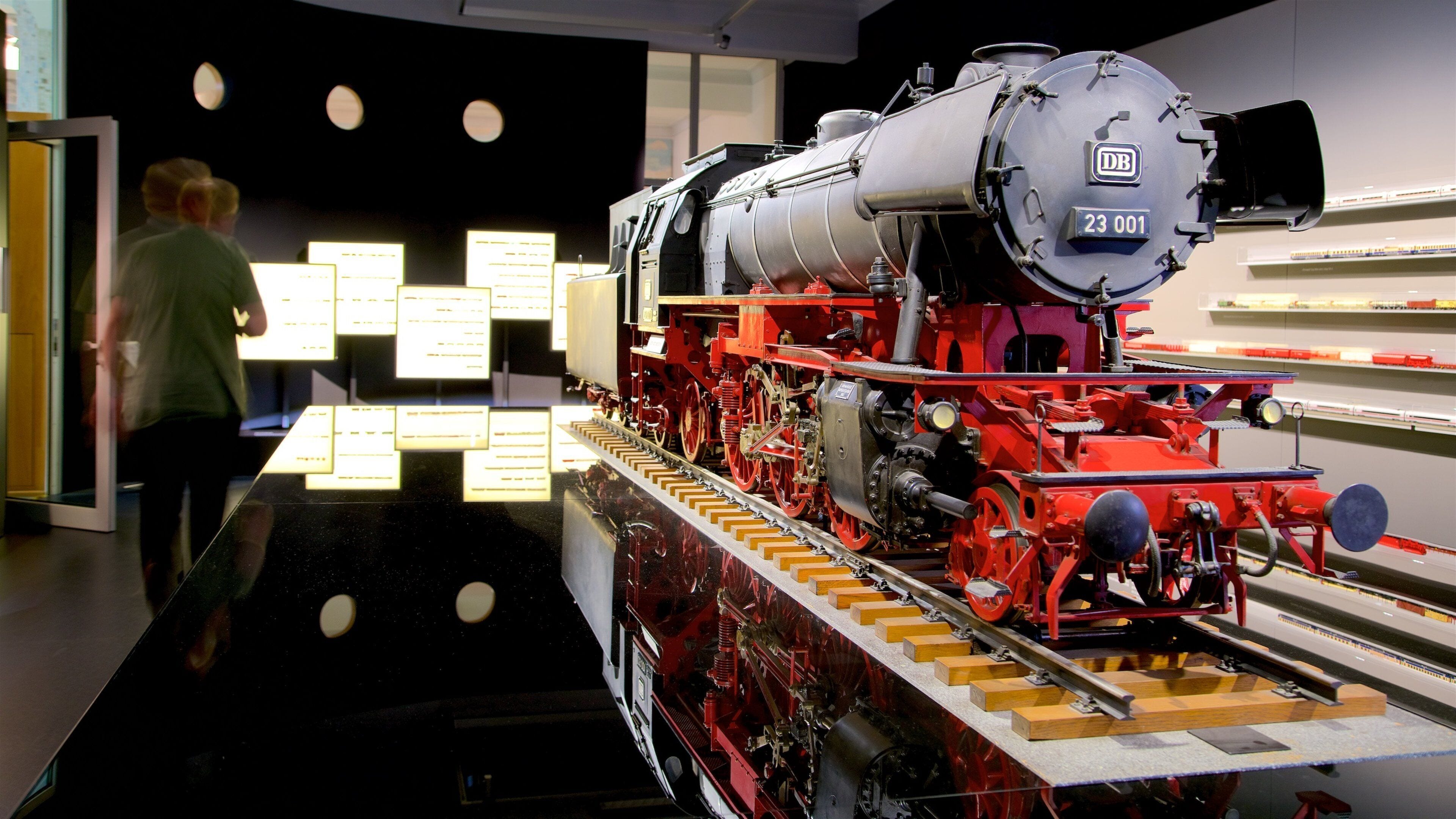 A steam locomotive with the number 23 001 displayed on its front.