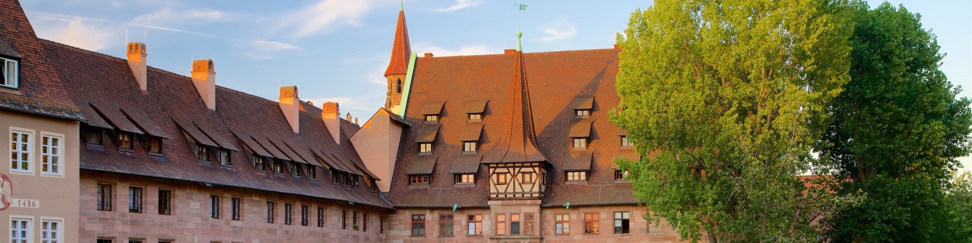 Heilig Geist Spital featuring heritage elements and a river or creek