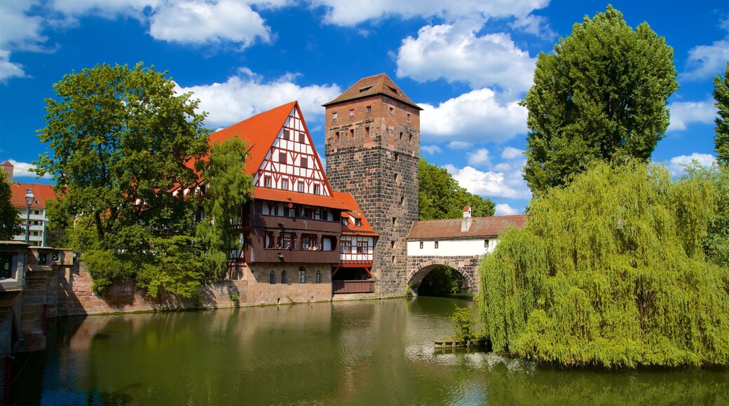 Maxbrucke which includes a bridge, a river or creek and heritage elements