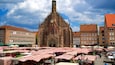 Hauptmarkt showing heritage architecture, markets and a church or cathedral