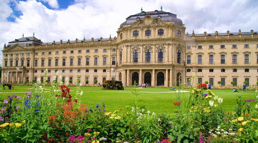 Wuerzburg Residence showing wild flowers, a garden and heritage architecture