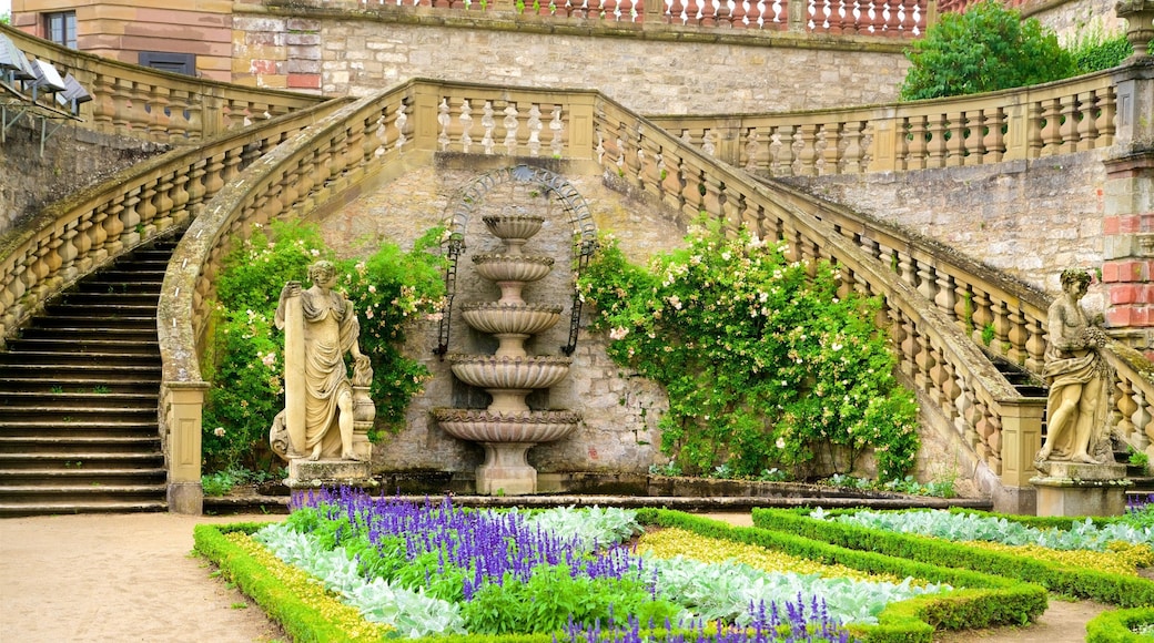 Fortress Marienberg showing wild flowers, heritage elements and a park