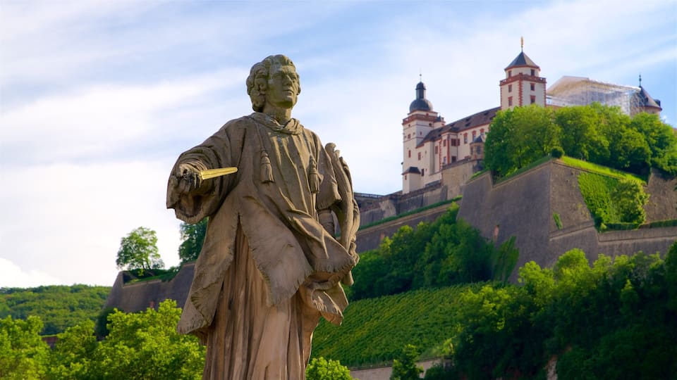 Alte Mainbruecke showing heritage architecture and a statue or sculpture