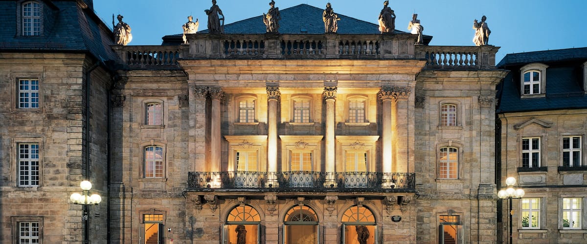 Margrave\'s Opera House which includes heritage architecture and night scenes