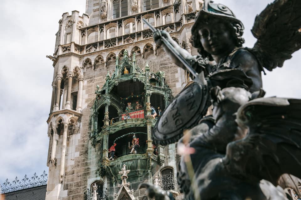 A Gothic cathedral with intricate stonework and statues.