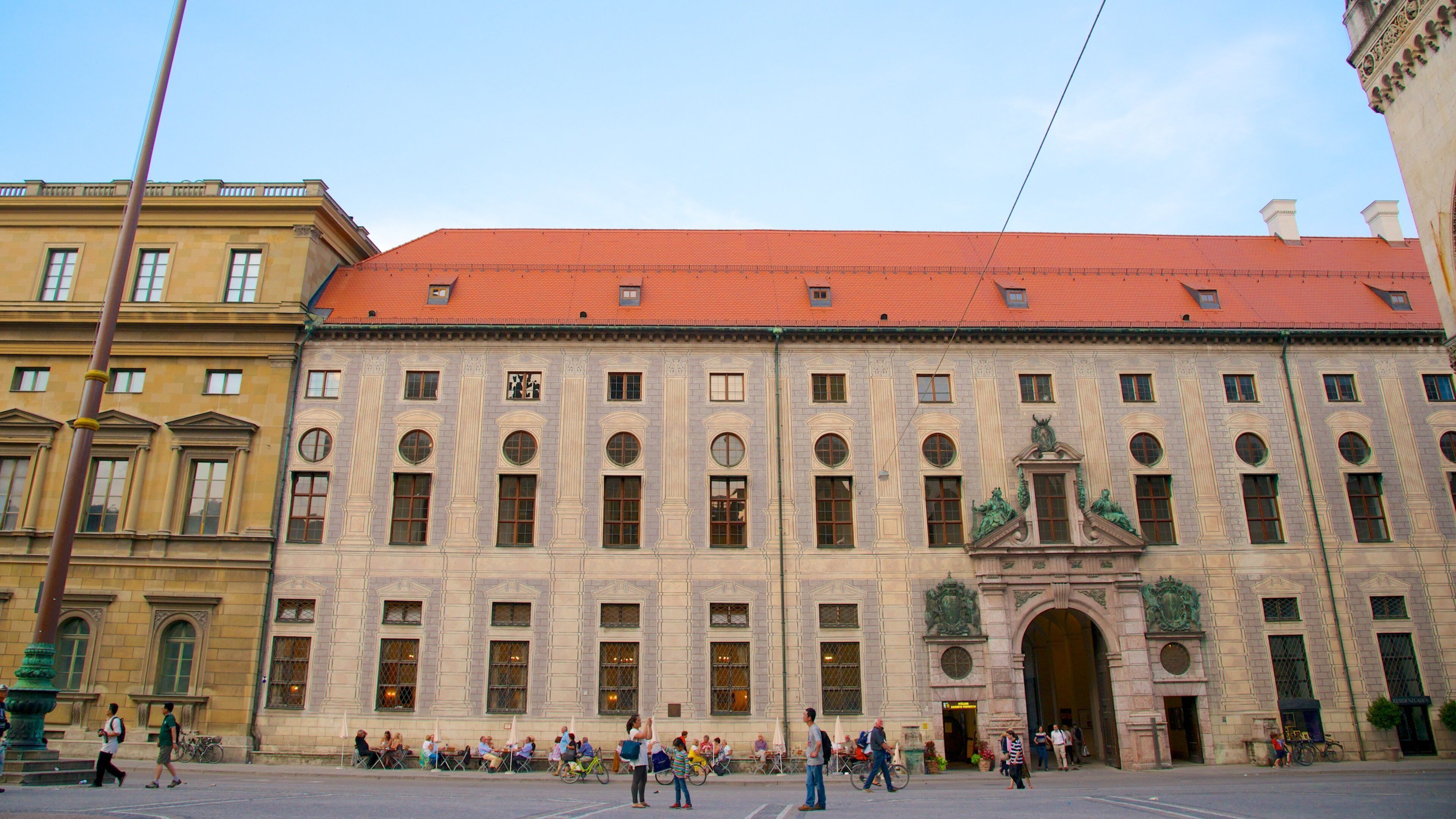 Odeonsplatz which includes a square or plaza, heritage architecture and street scenes