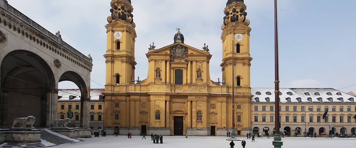 Odeonsplatz which includes a square or plaza, snow and heritage architecture