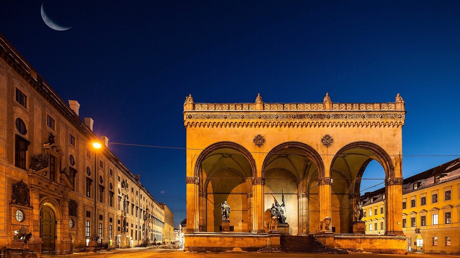 Odeonsplatz featuring heritage architecture and night scenes