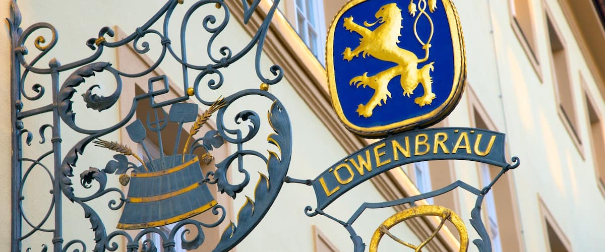 Lowenbrau featuring signage and a city