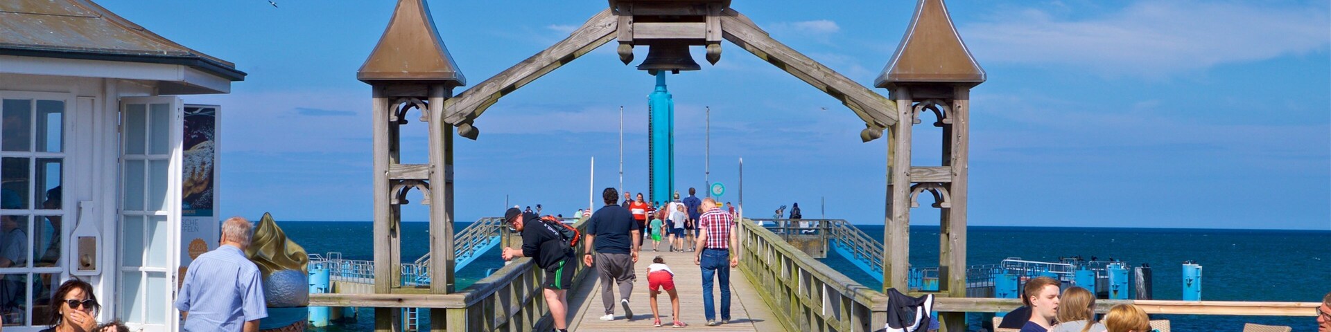 Sellin Pier as well as a small group of people