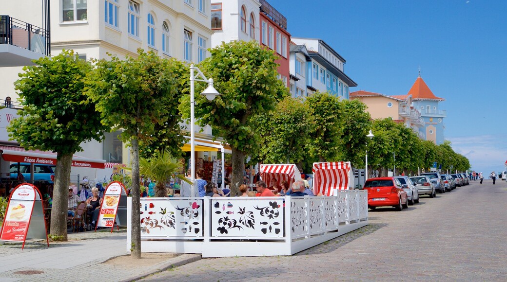 Sellin Pier which includes outdoor eating as well as a small group of people