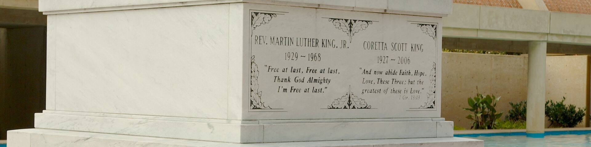 A memorial monument with inscriptions for Rev. Martin Luther King, Jr. and Coretta Scott King.