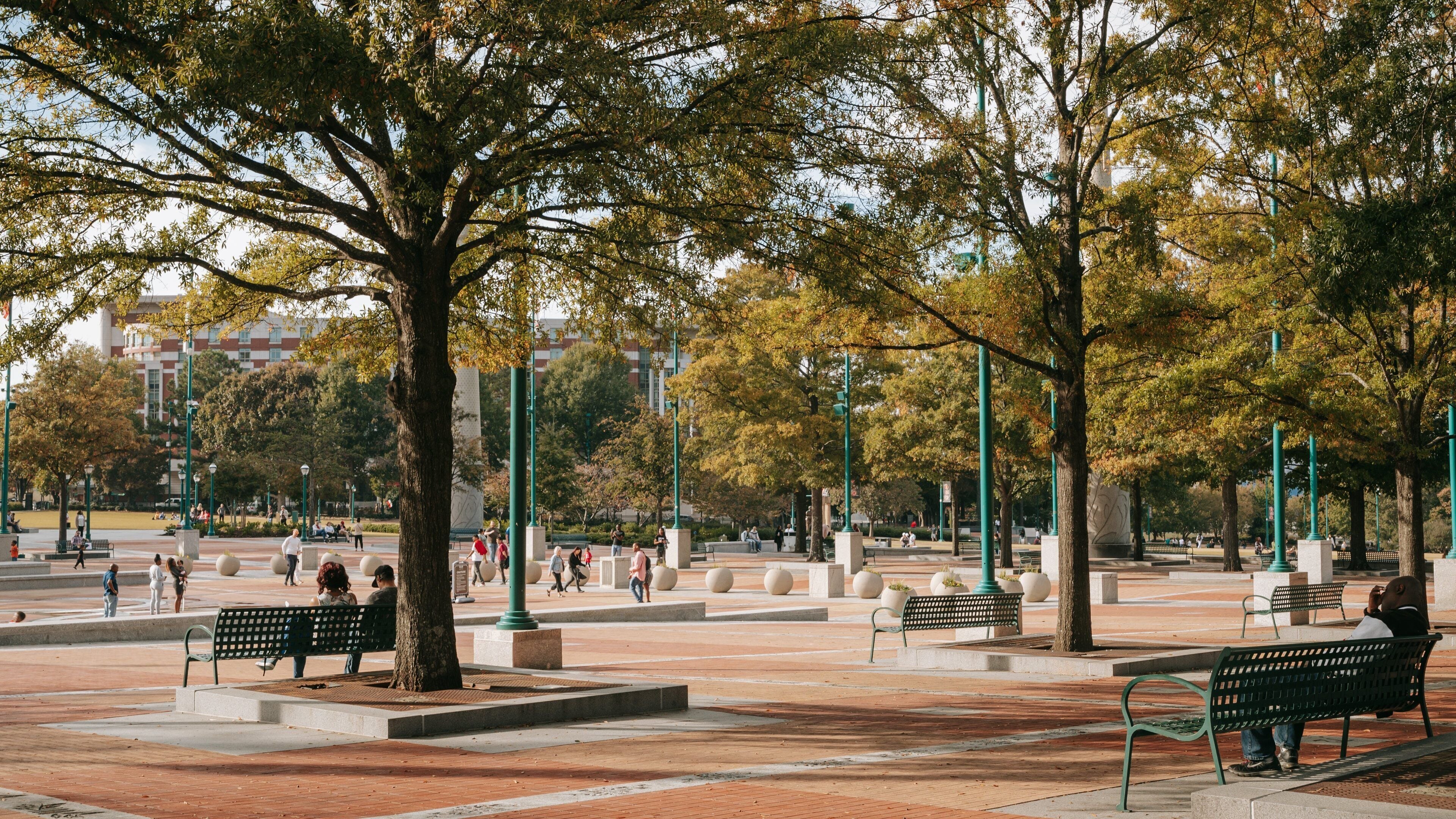 Centennial Olympic Park featuring a square or plaza as well as a couple