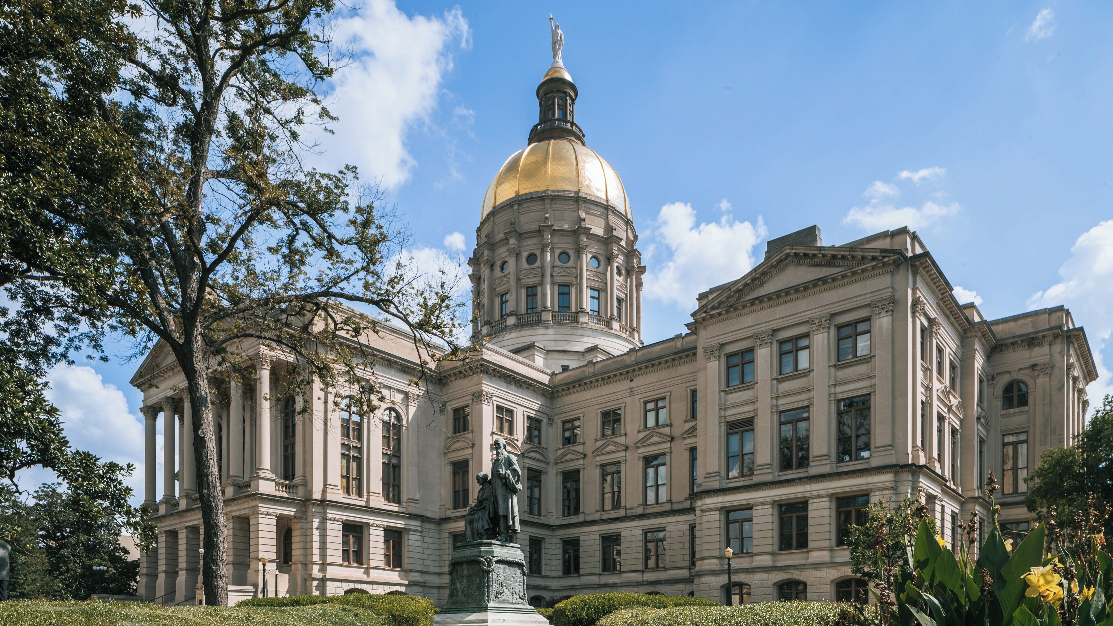 Georgia State Capitol showcases stunning architecture against a clear blue sky in downtown Atlanta, Georgia, United States