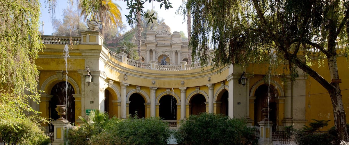 Santa Lucia Hill featuring a pond, chateau or palace and a park