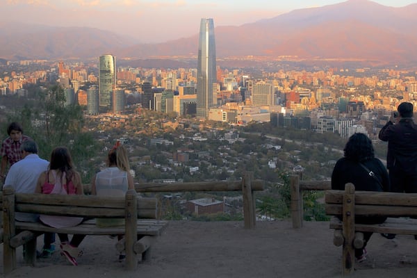 San Cristobal Hill showing views, a sunset and skyline