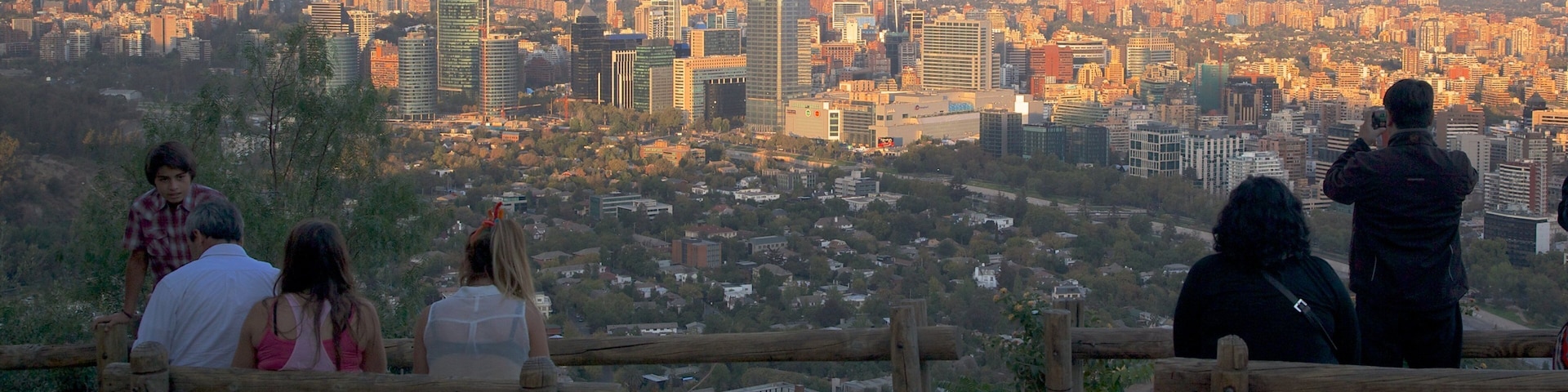 San Cristobal Hill showing views, a sunset and skyline