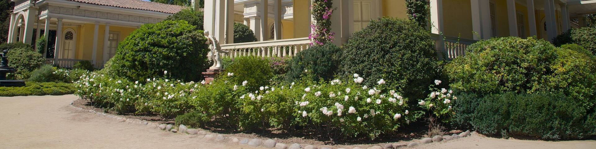 Concha Y Toro Winery which includes heritage architecture and flowers