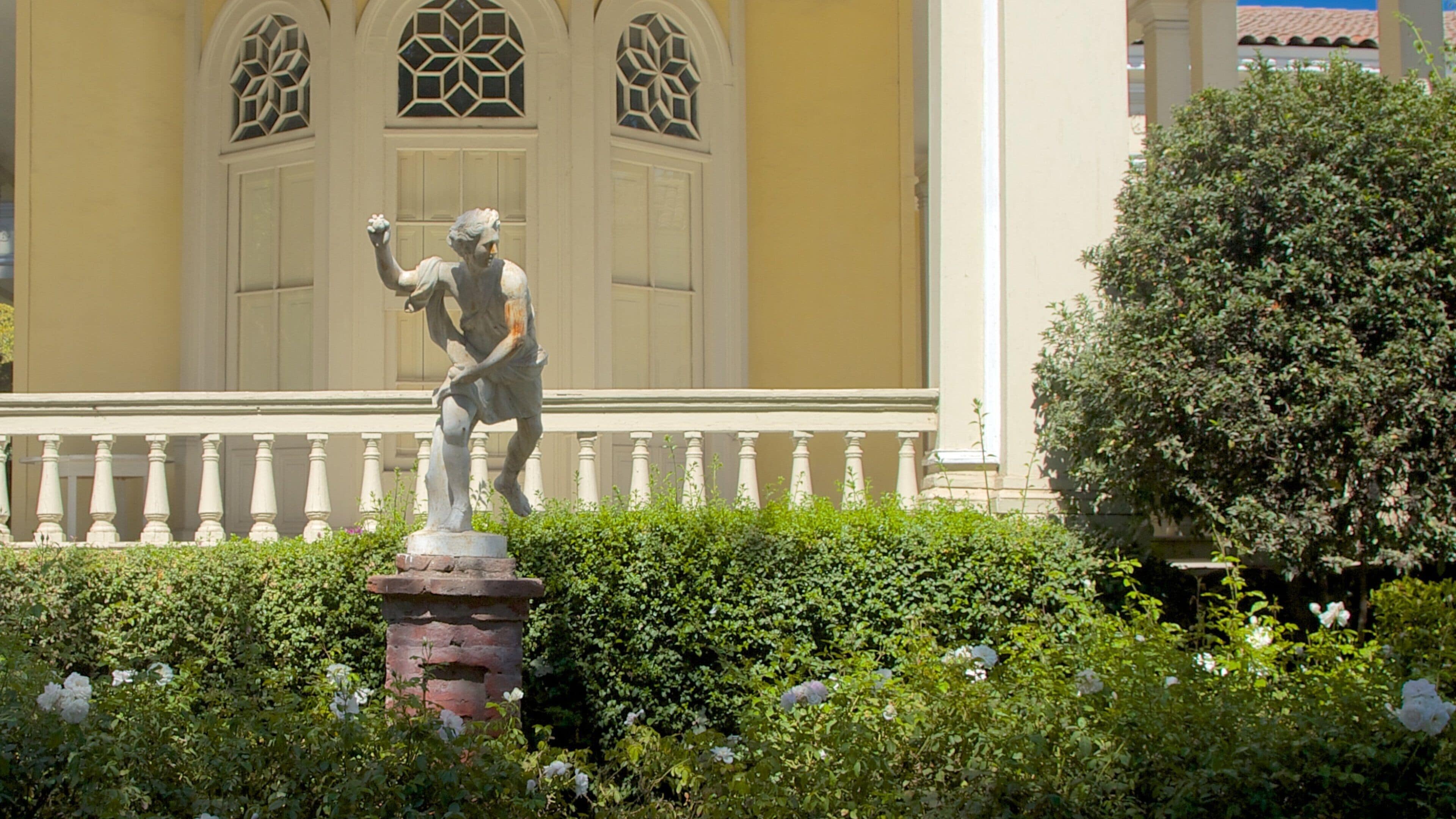 Concha Y Toro Winery featuring art, a statue or sculpture and a park