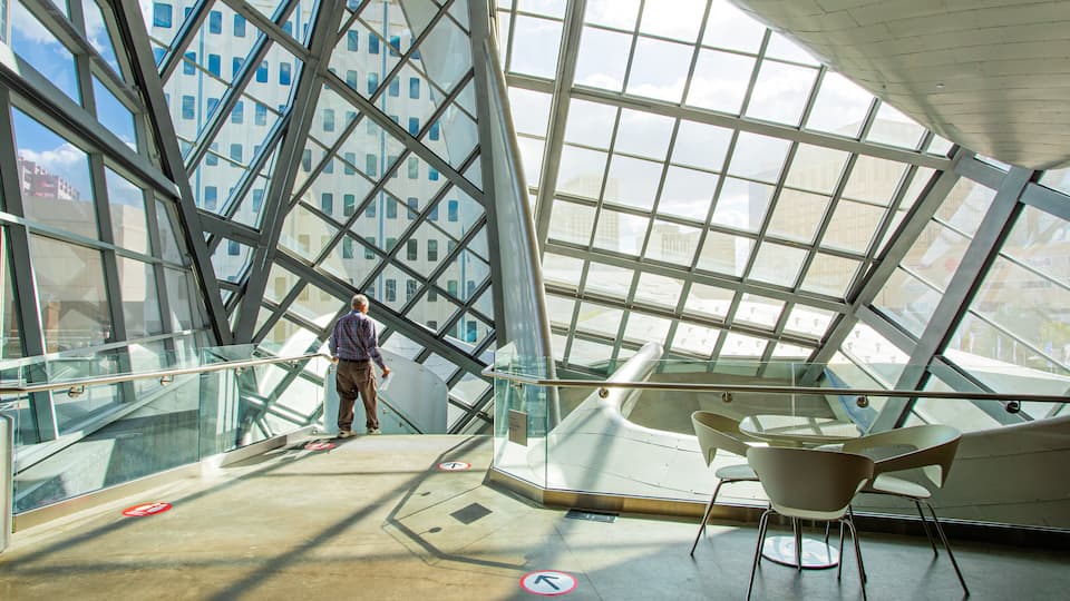 Art Gallery of Alberta featuring modern architecture and interior views as well as an individual male