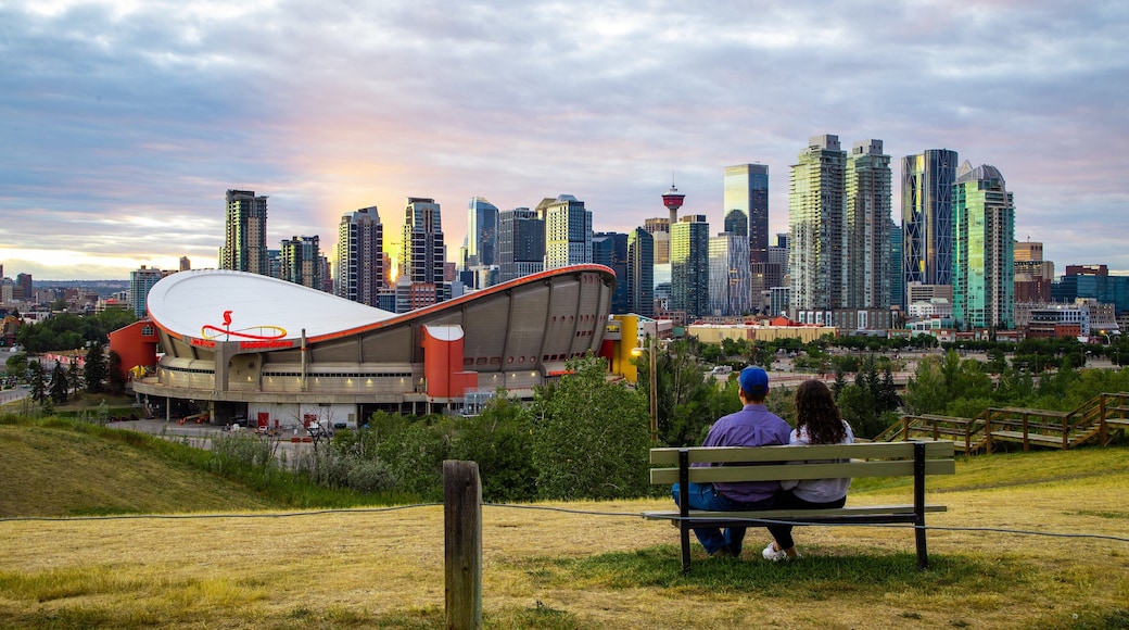 Scotiabank Saddledome featuring a park, a sunset and landscape views