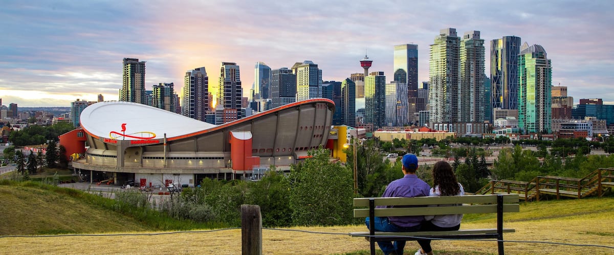 Scotiabank Saddledome featuring a park, a sunset and landscape views