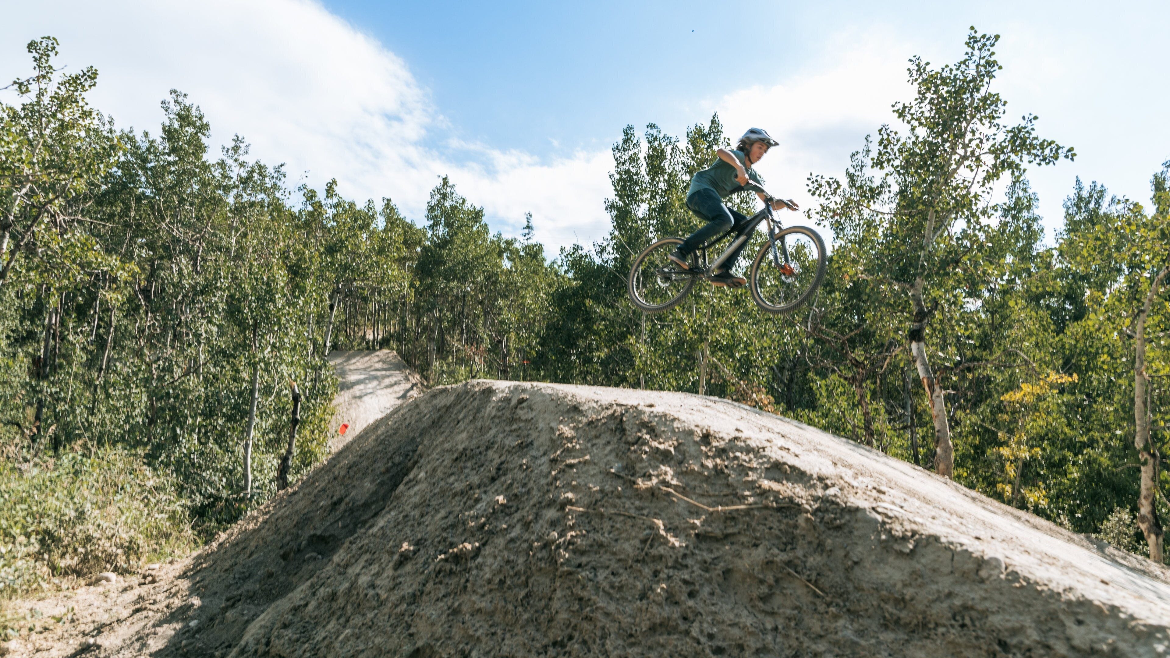 Canada Olympic Park featuring mountain biking as well as an individual child
