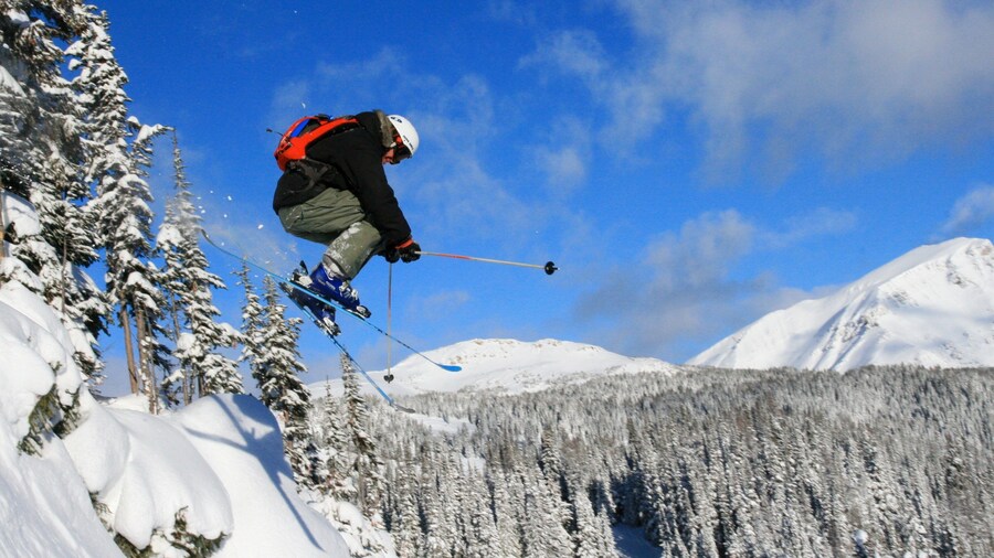 Sunshine Village featuring a sporting event, snow skiing and snow